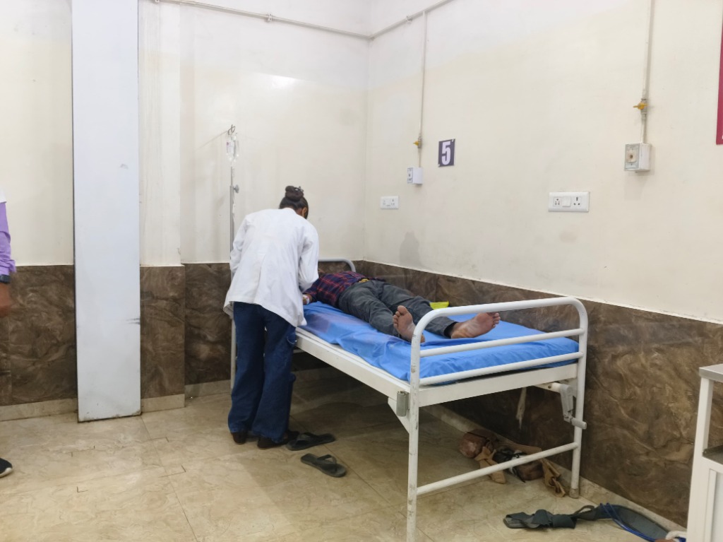Nurse Attending Patient Bed No 5 General Ward Life Care Hospital